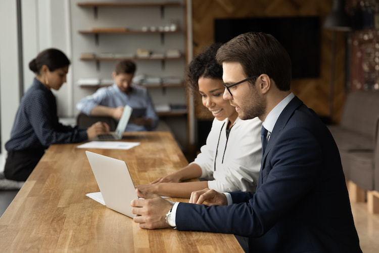 researchers discussing their business research project and employee engagement