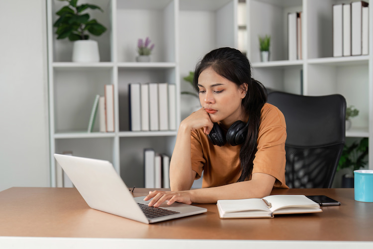 An active researcher working at home casually. 
