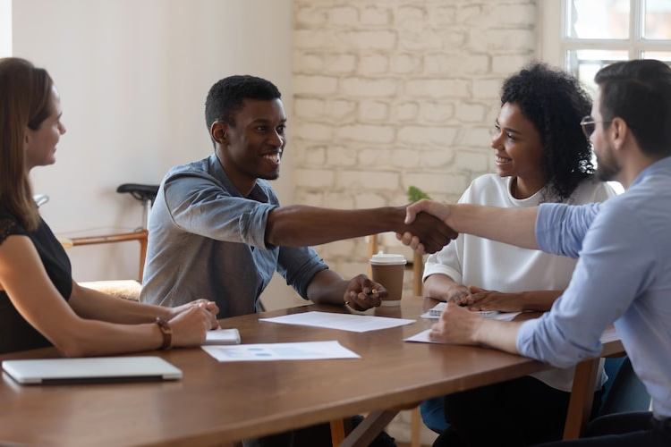 Professional workers agreeing in a discussion.